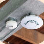 Wi-Fi access point mounted in modern office providing wireless connectivity for business devices